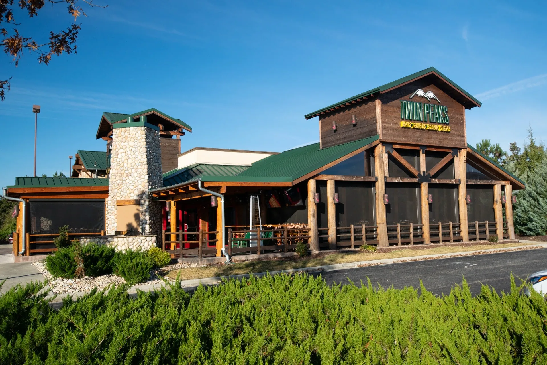 Go-Fenetex solar shade screens for commercial restaurant patio – reduces heat keeps tables full