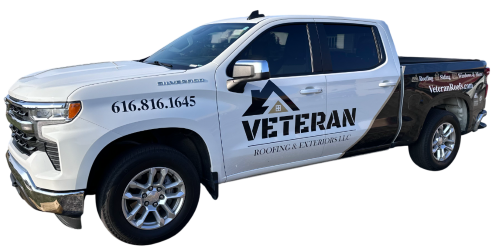 Veteran Roofing service truck used for local shingle roof repairs