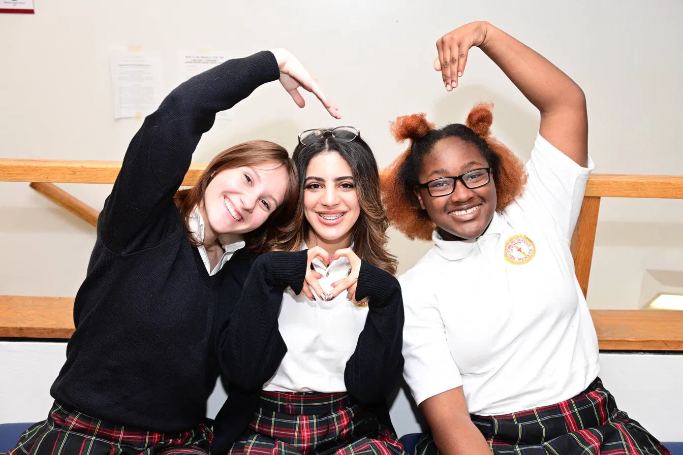 Kew-Forest students smiling together