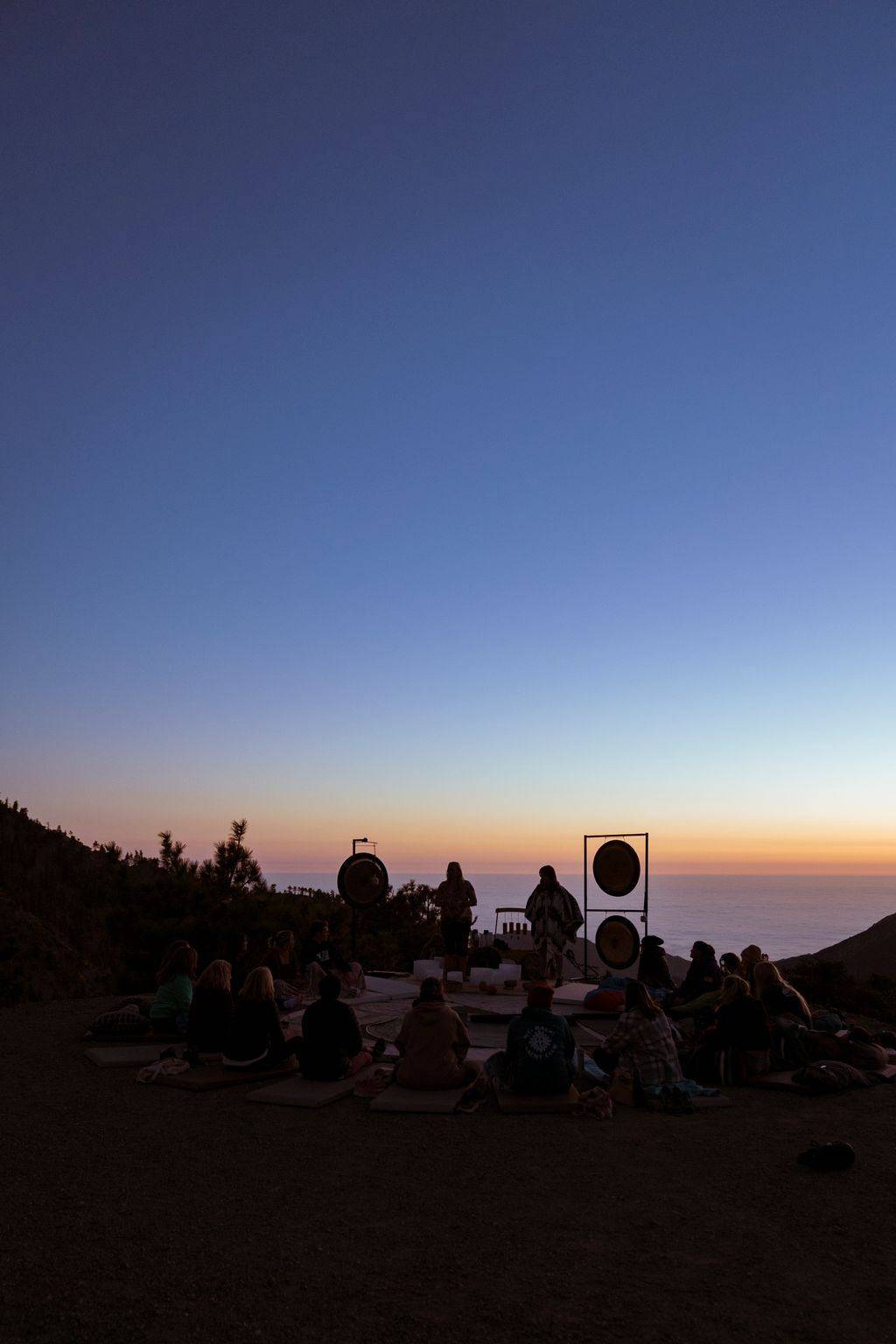 Guests watching the sunset from the mountain