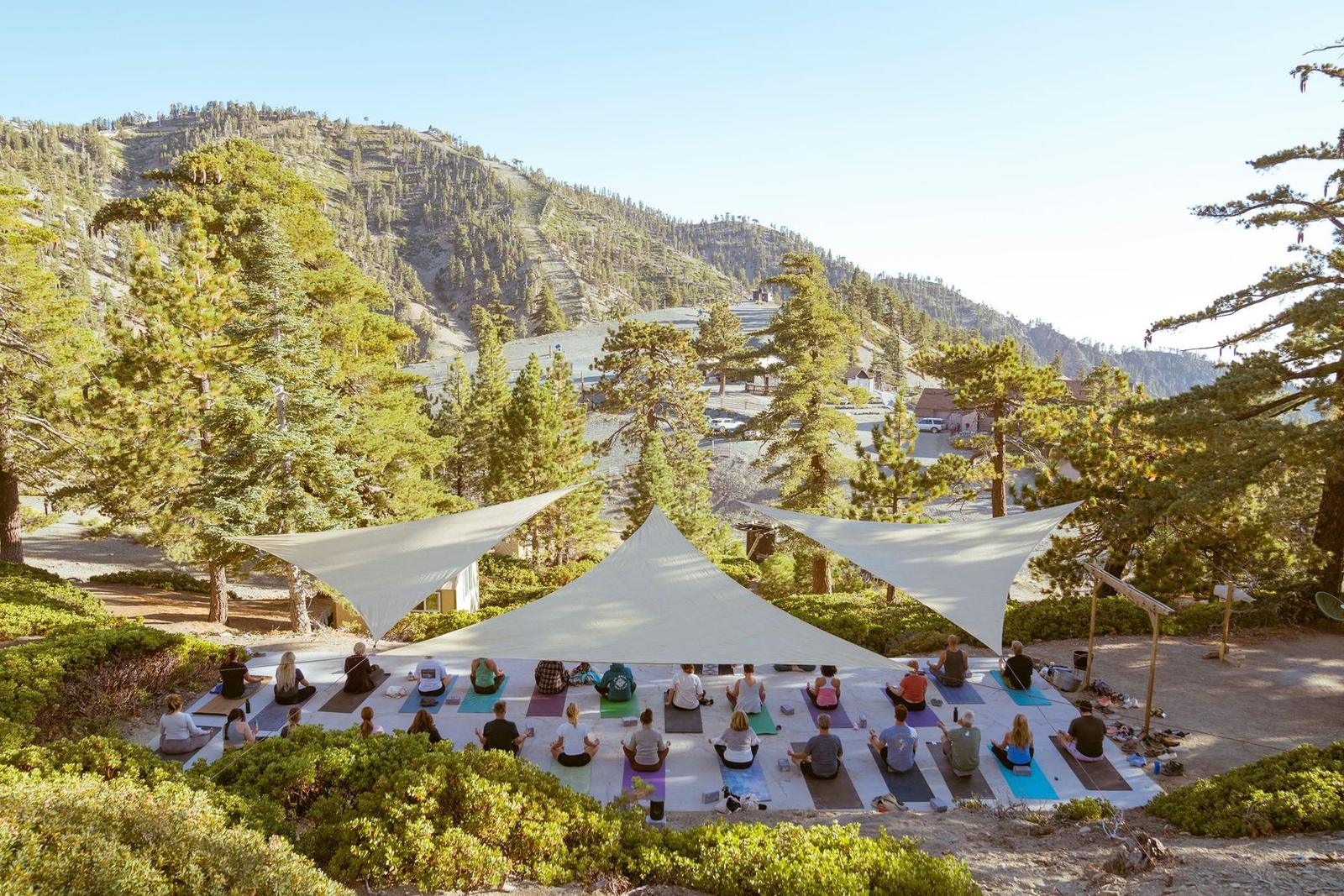 Yoga class under shade sails on Mt Baldy