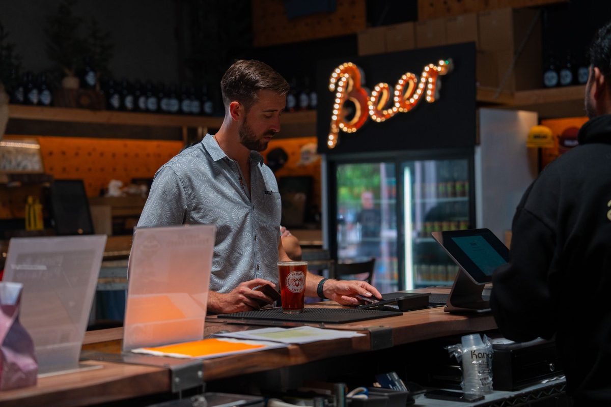 A bartender pouring at the Baldy Brewery taproom