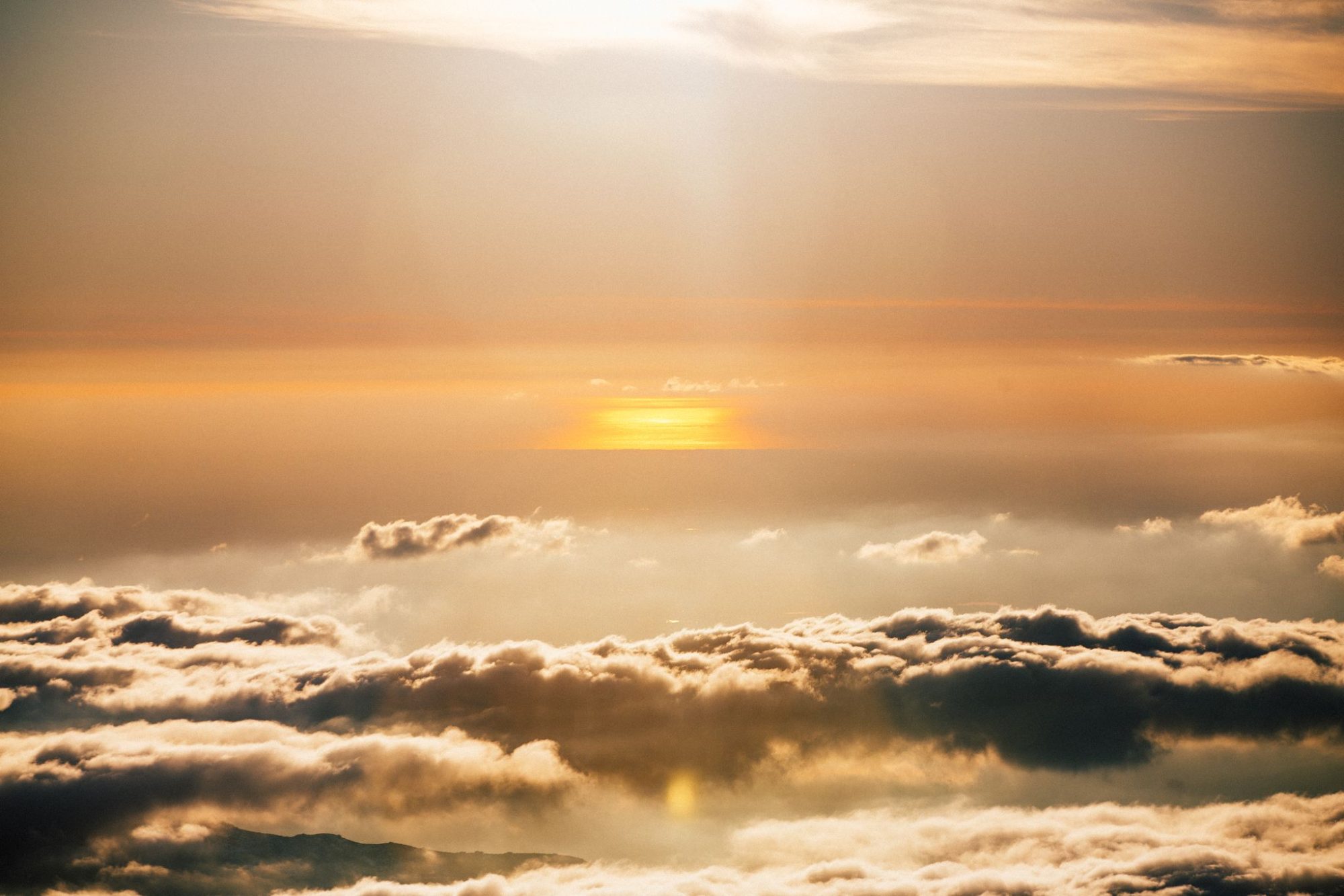 Sunset over a sea of clouds below Mt Baldy