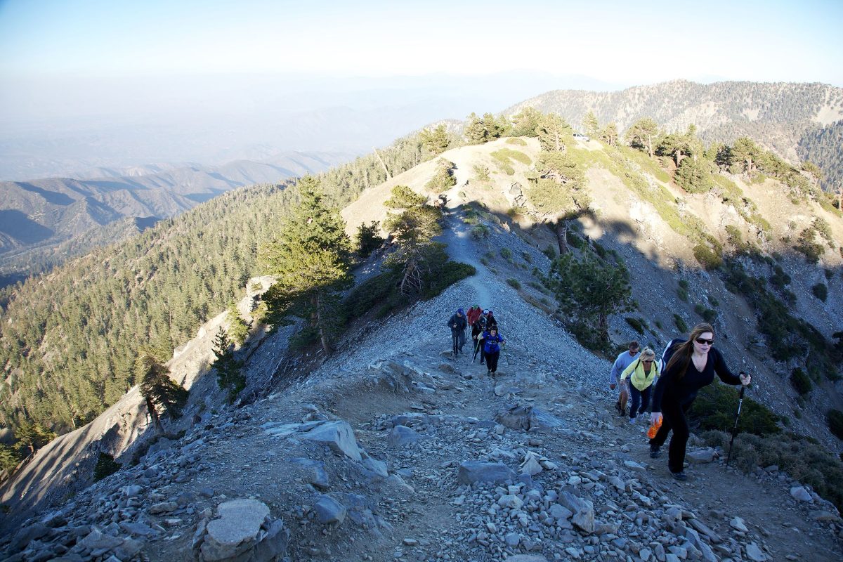 Hikers climbing the ridge trail
