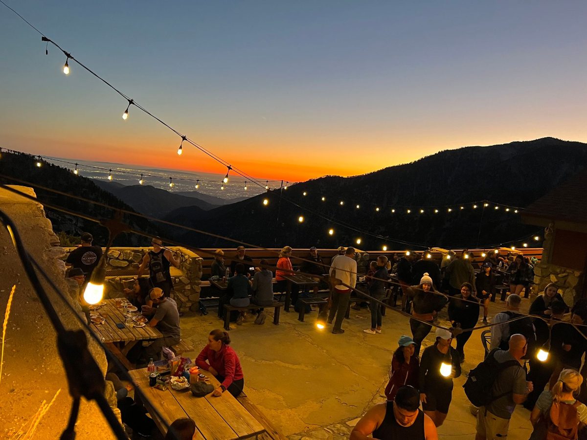Guests on the Top of the Notch deck at dusk