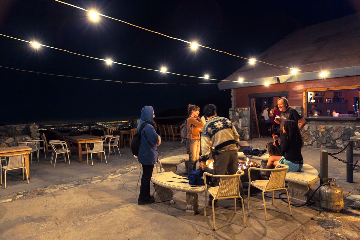 The Notch deck at night under string lights