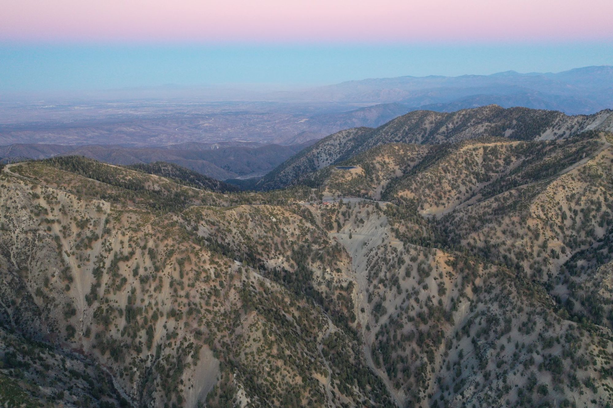 A summer sunset looking back over the mountains