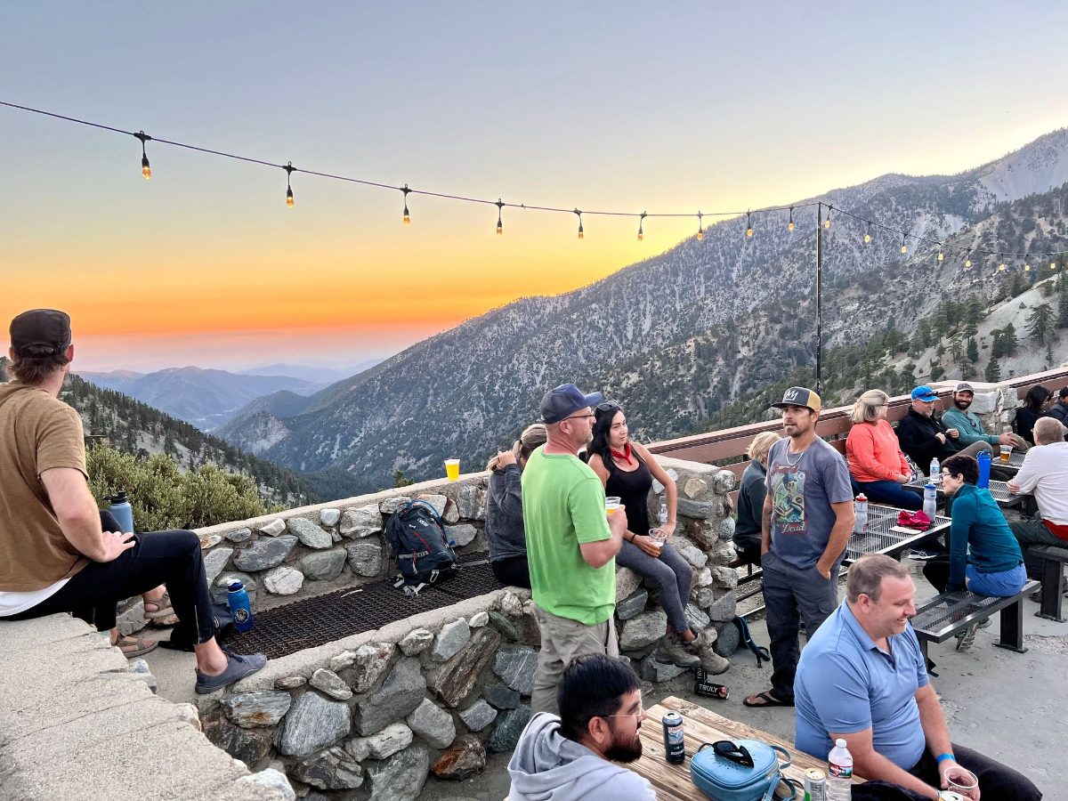 A Moonlight Hike group on the Notch deck at sunset