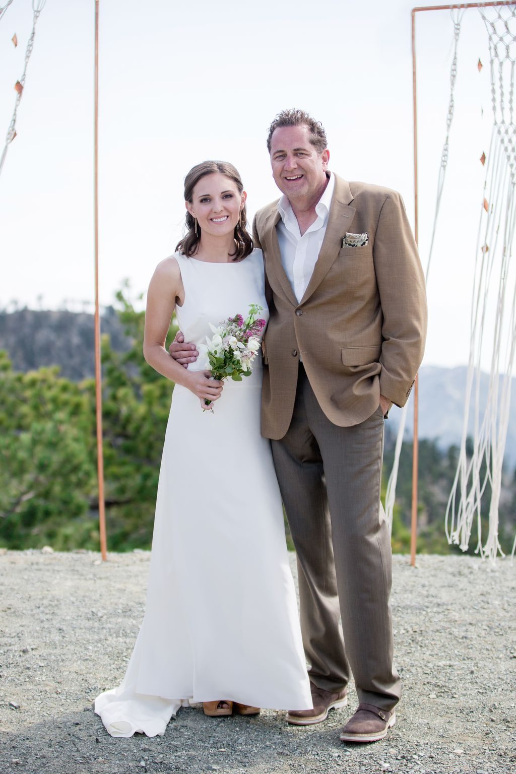 A bride and groom on the mountain