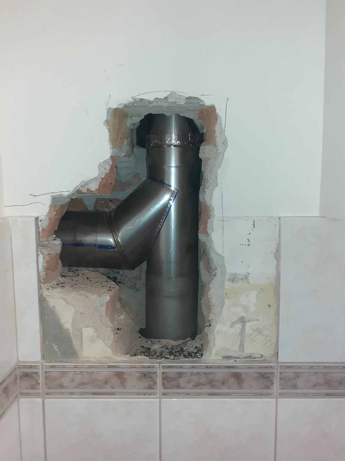 Sanacija postojećeg dimnjaka — montaža inox cijevi unutar zidanog dimnjaka