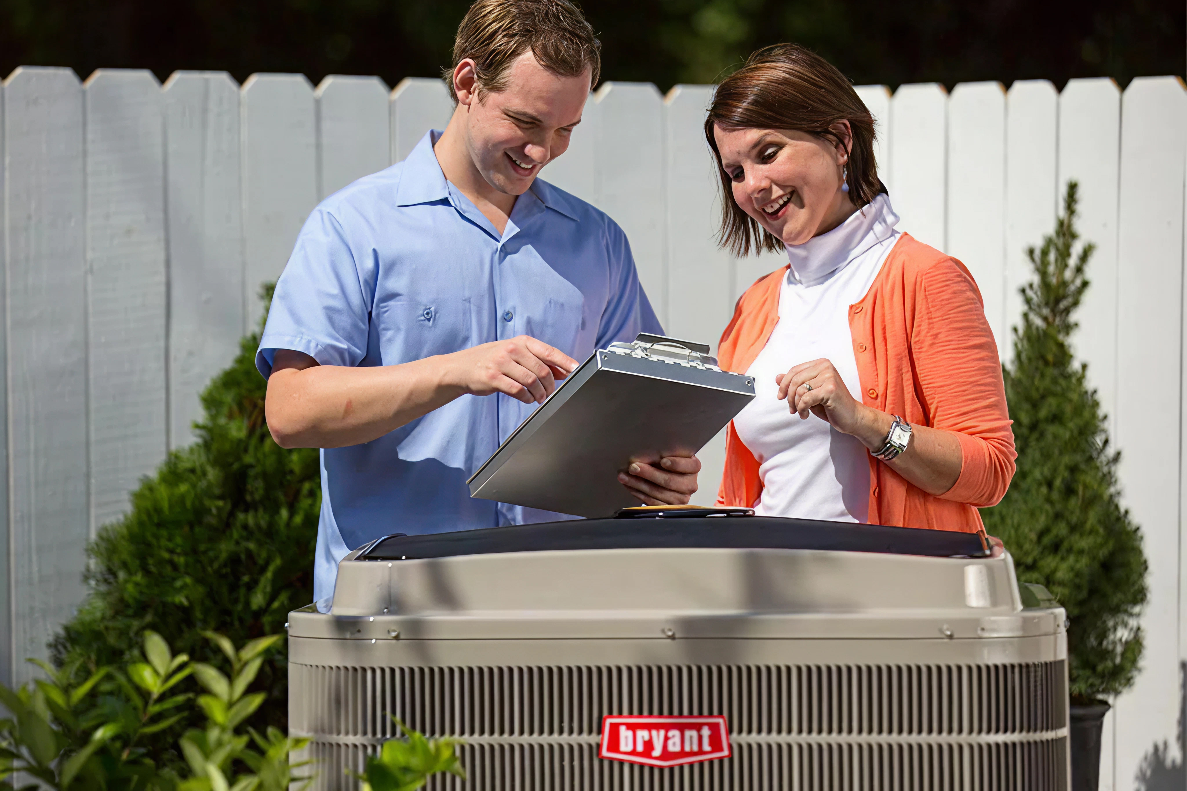 R&T Yoder technician with homeowner