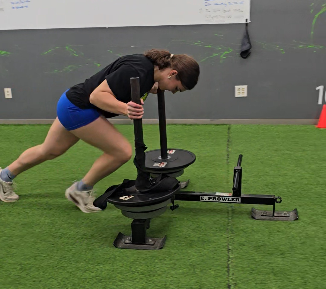 High school athlete sled push training at Wisconsin Sports Performance in Menomonee Falls, WI