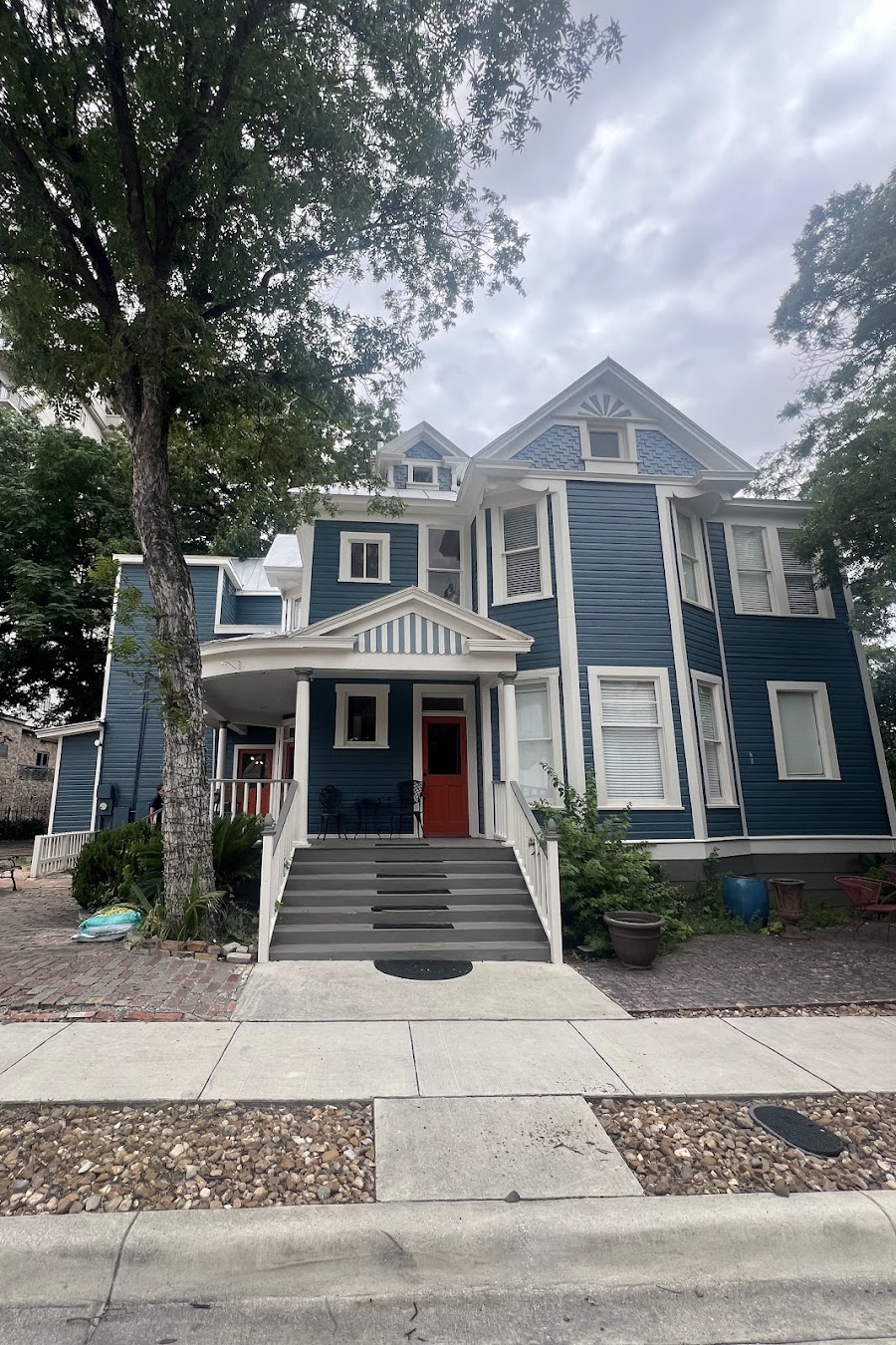 Customer-submitted photo of a downtown historic home painted for Roland Cavazos