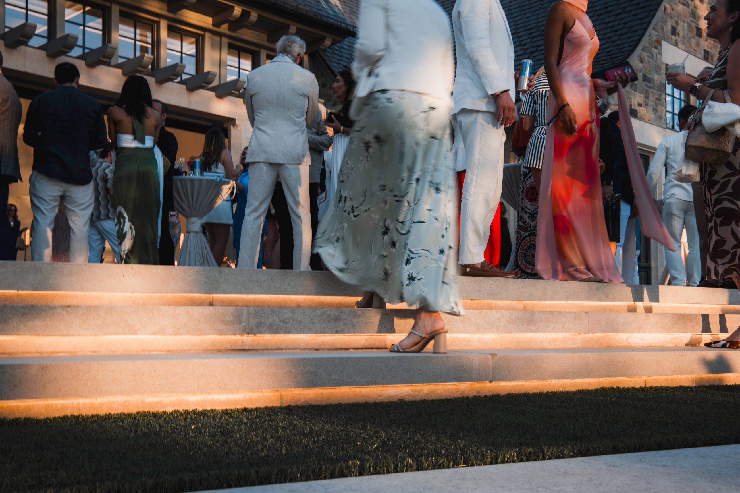 Guests arriving on the estate steps at Motion and Muse