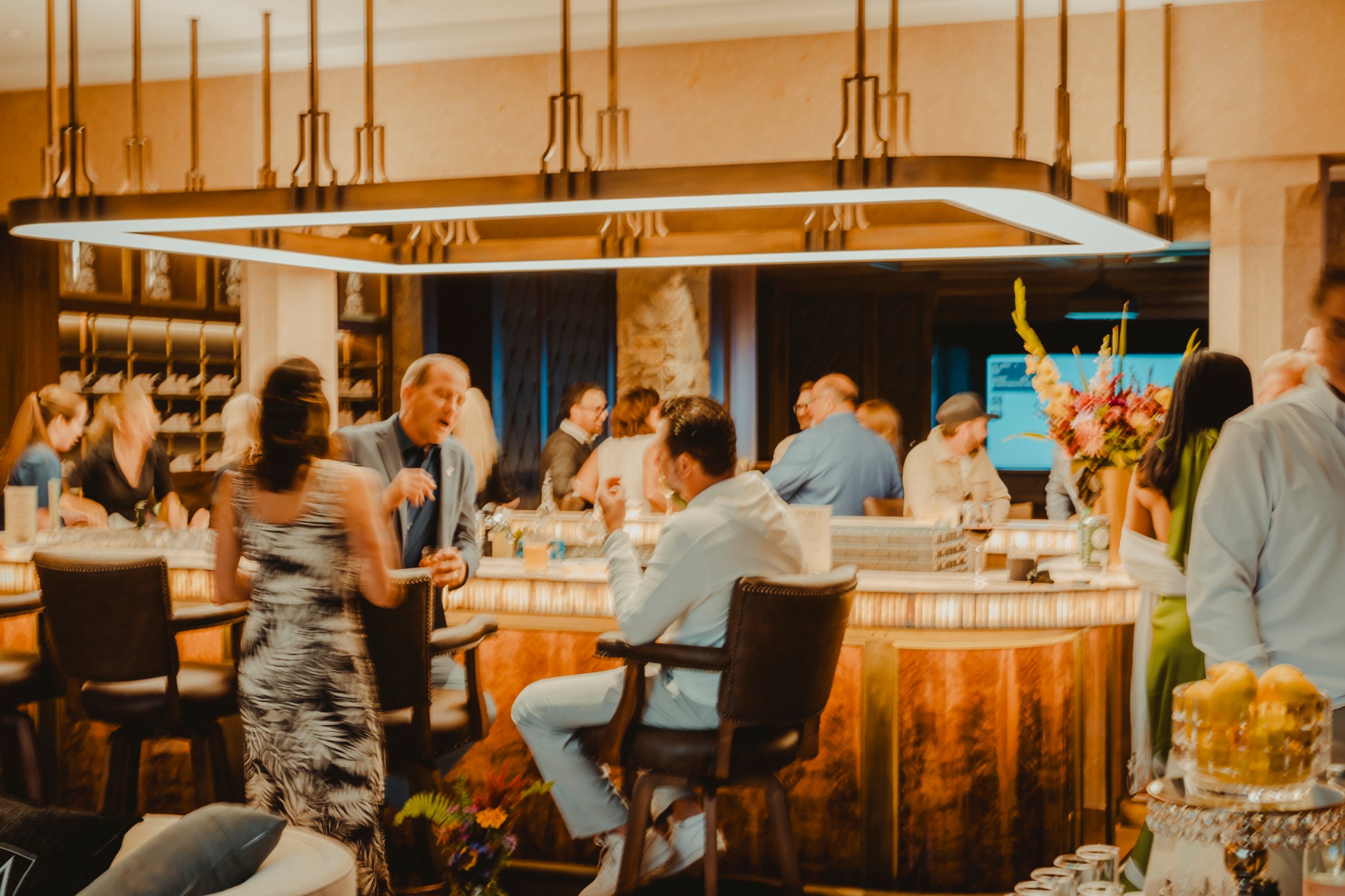 Guests gathered at the bar