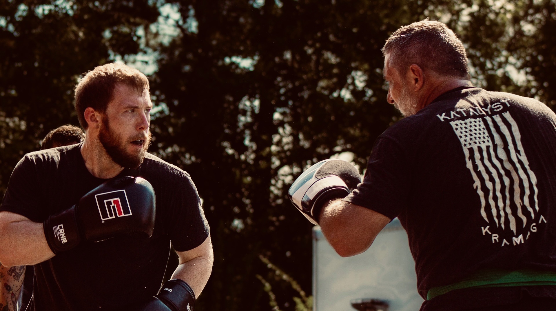 Students practicing striking techniques at Katalyst Kombatives