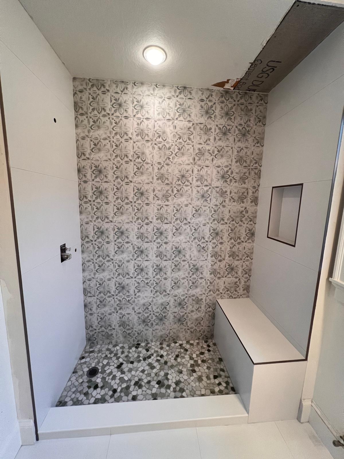 Lanin Tile showroom display of tile, laminate, and luxury vinyl options.