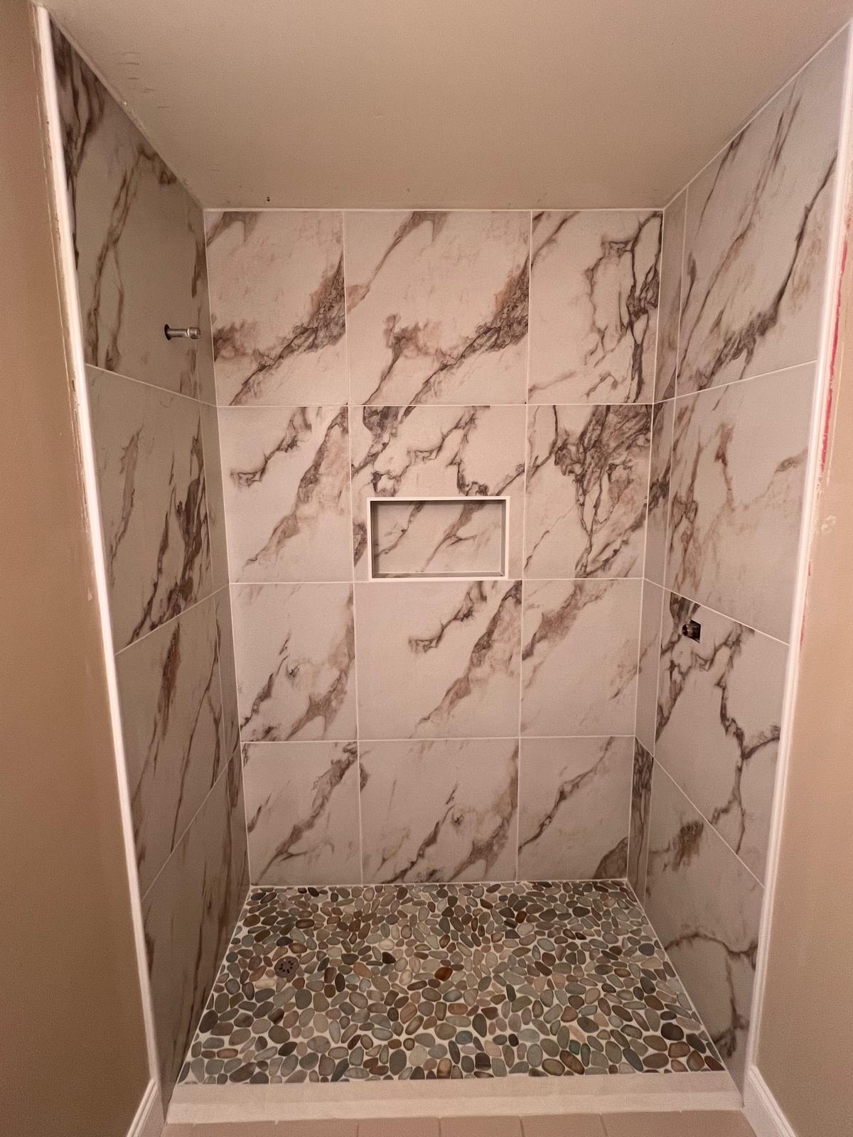 Lanin Tile showroom display of tile, laminate, and luxury vinyl options.