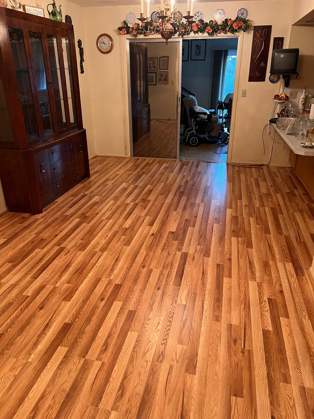 Lanin Tile showroom showcasing tile, laminate, and luxury vinyl flooring.