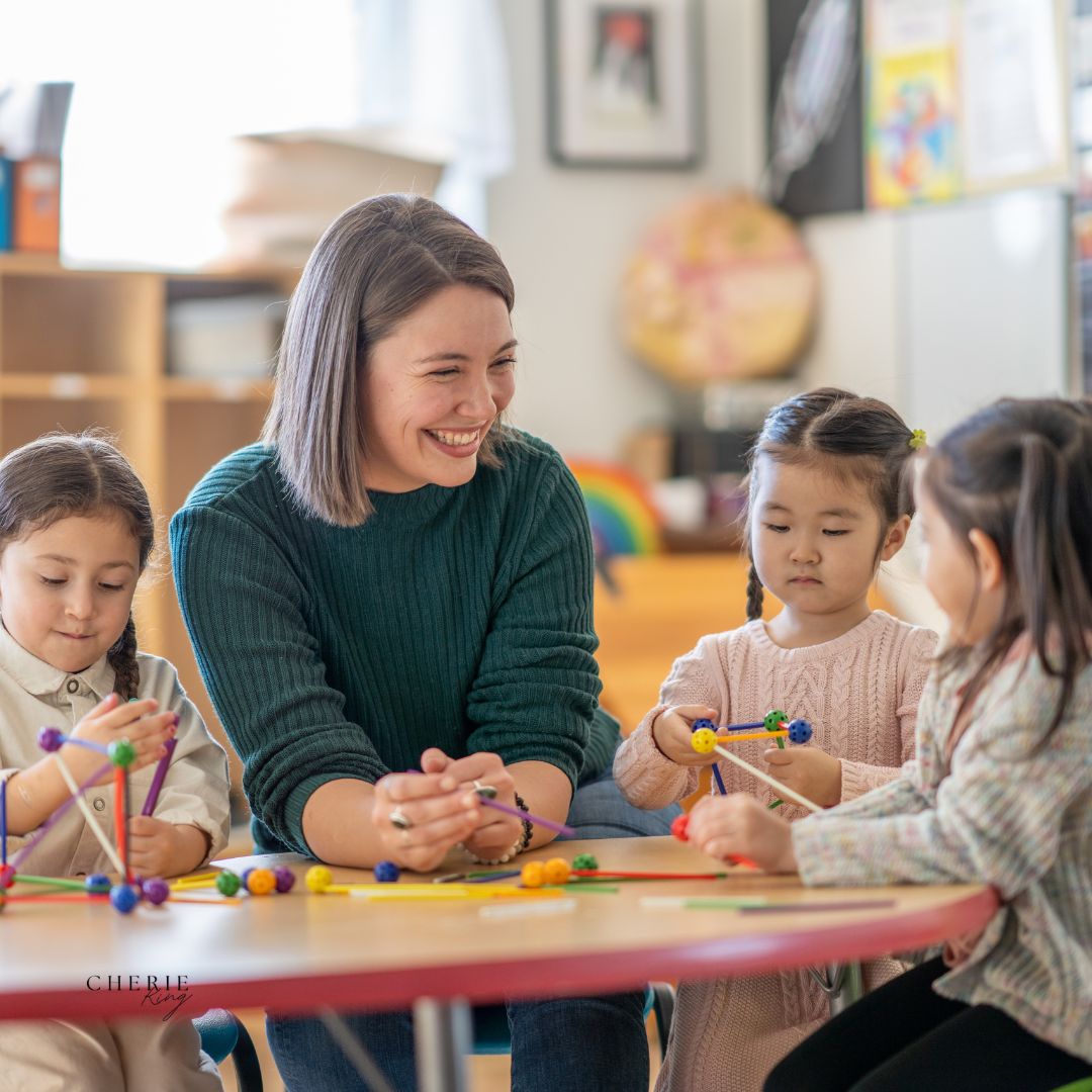 Teacher and students connecting. Teacher showing students they matter Teacher and students connecting. Teacher showing students they matter