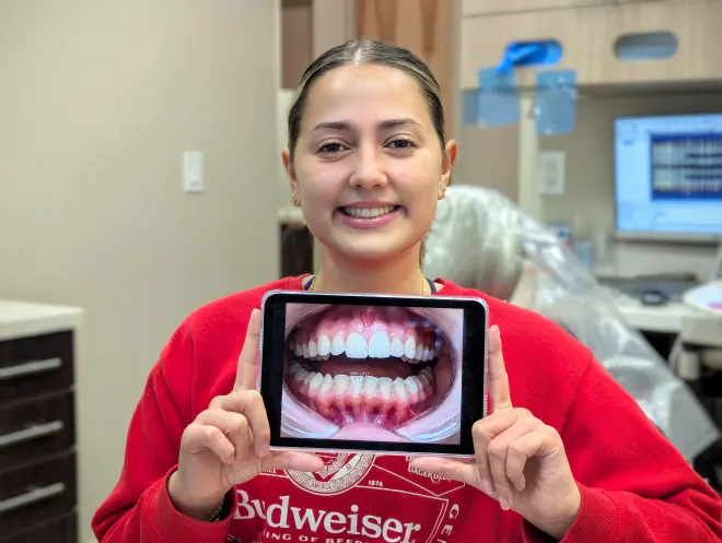 Promenade Invisalign patient smiling with her scan
