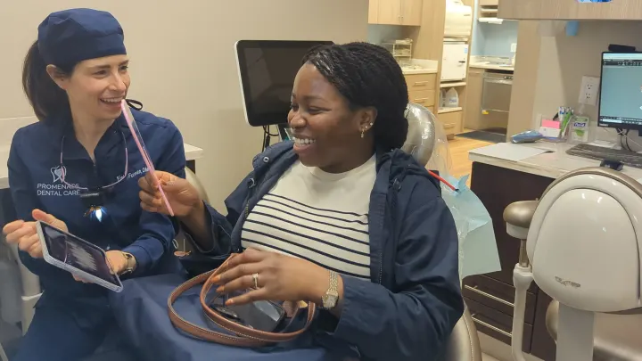 Dr. Furman laughing with a patient