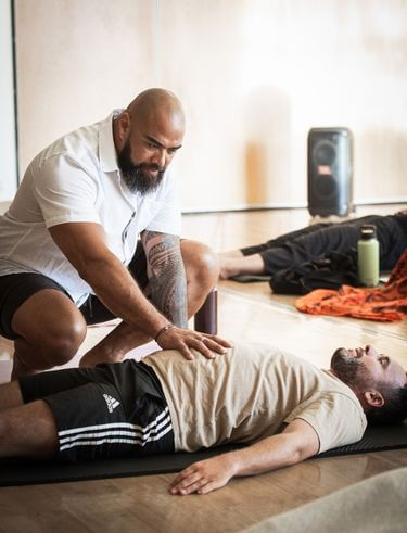 Man practicing breathwork meditation for nervous system regulation at off-grid men's retreat
