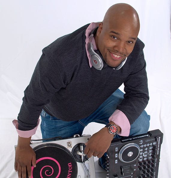 Professional DJ console decks mixing at event