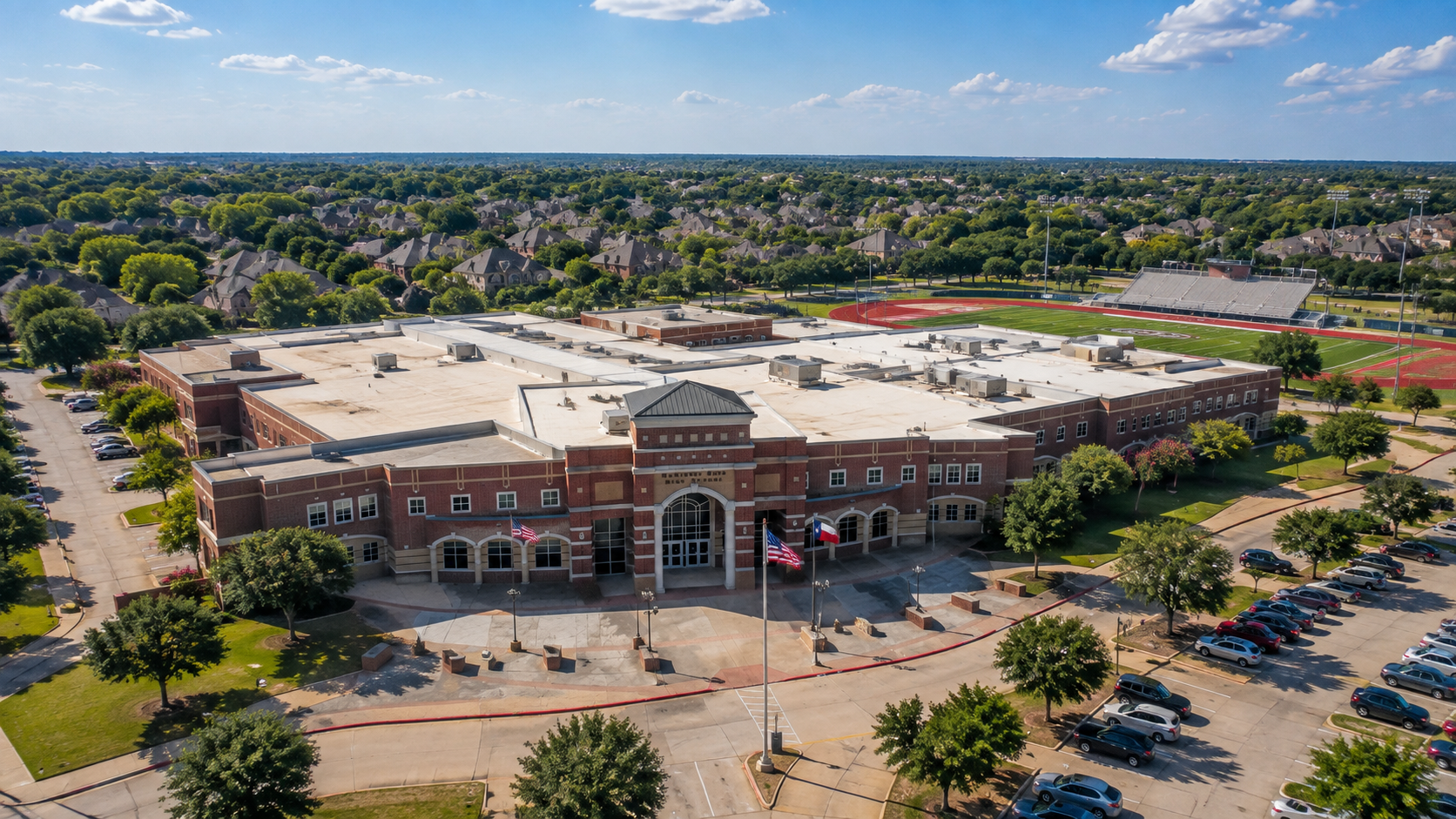 Aerial view of McKinney ISD school campus in McKinney, Texas, surrounded by residential neighborhoods, athletic fields, and school facilities.