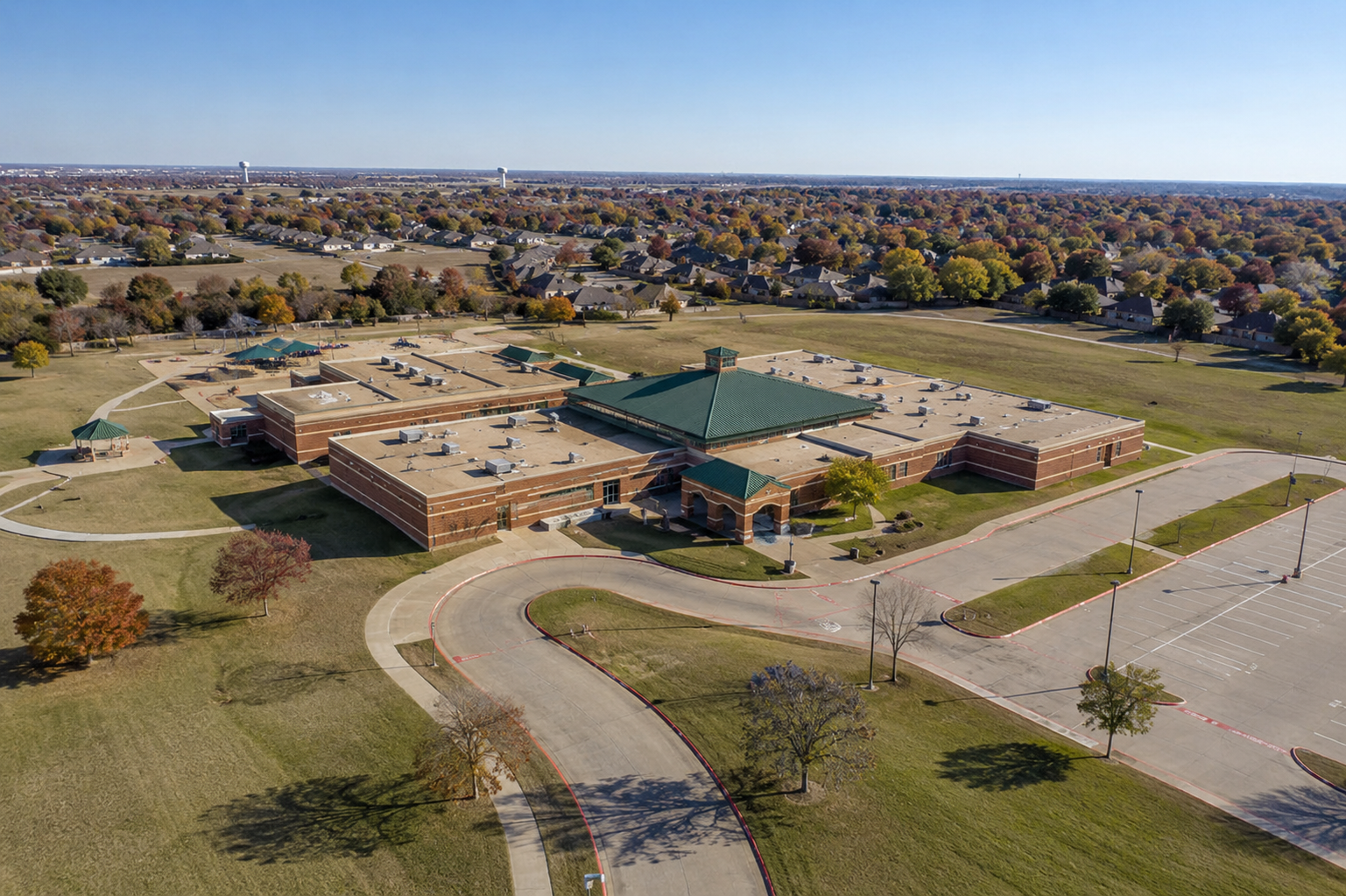Aerial view of Minshew Elementary School in McKinney, Texas, surrounded by residential neighborhoods and homes within McKinney ISD.