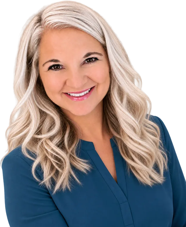 Amy Johnson, smiling, silver hair, dark teal shirt