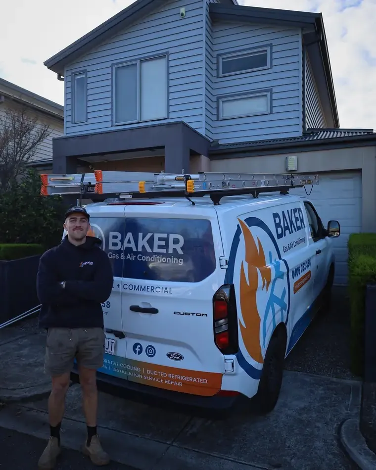 Jack Baker beside the Baker Gas and Air Conditioning van on a job in Melbourne