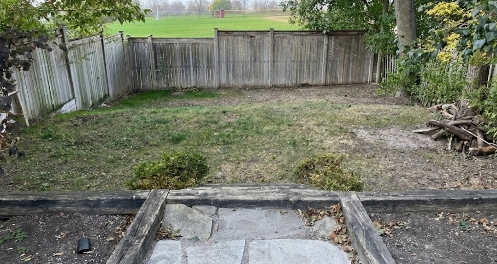 Uneven backyard Houston grading leveling service