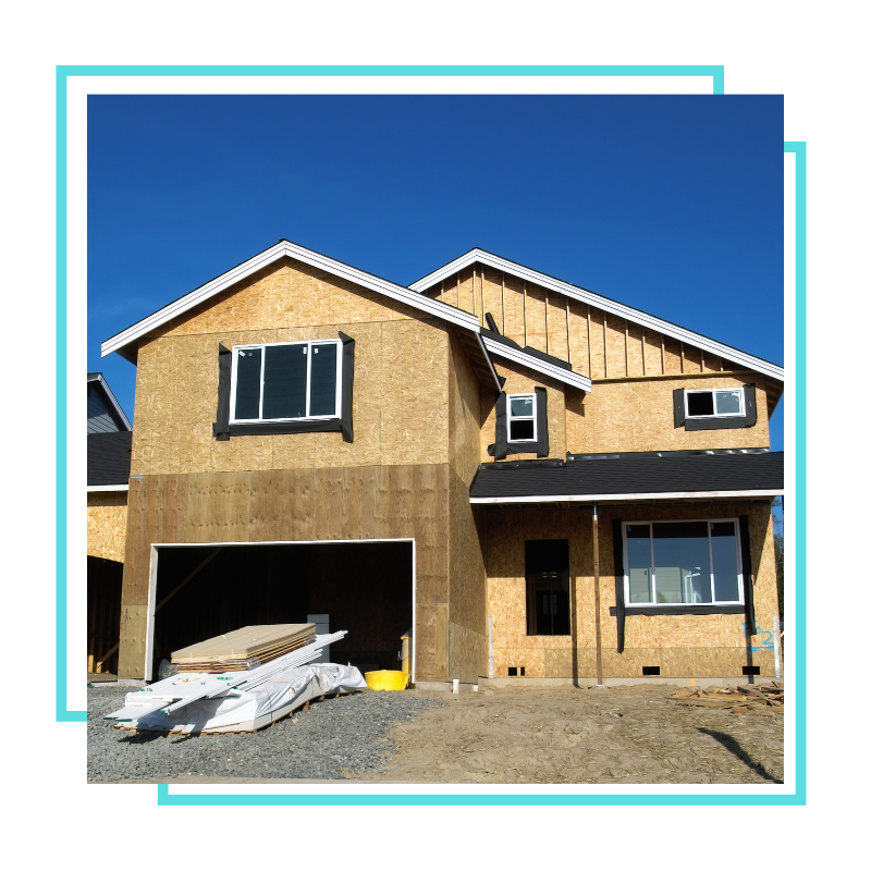 Room addition contractors reviewing a home addition layout in Centreville