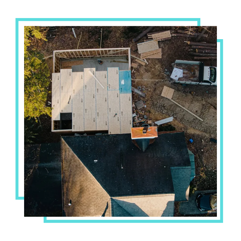 Roofing Company in Fairfax, VA checking roof shingles
