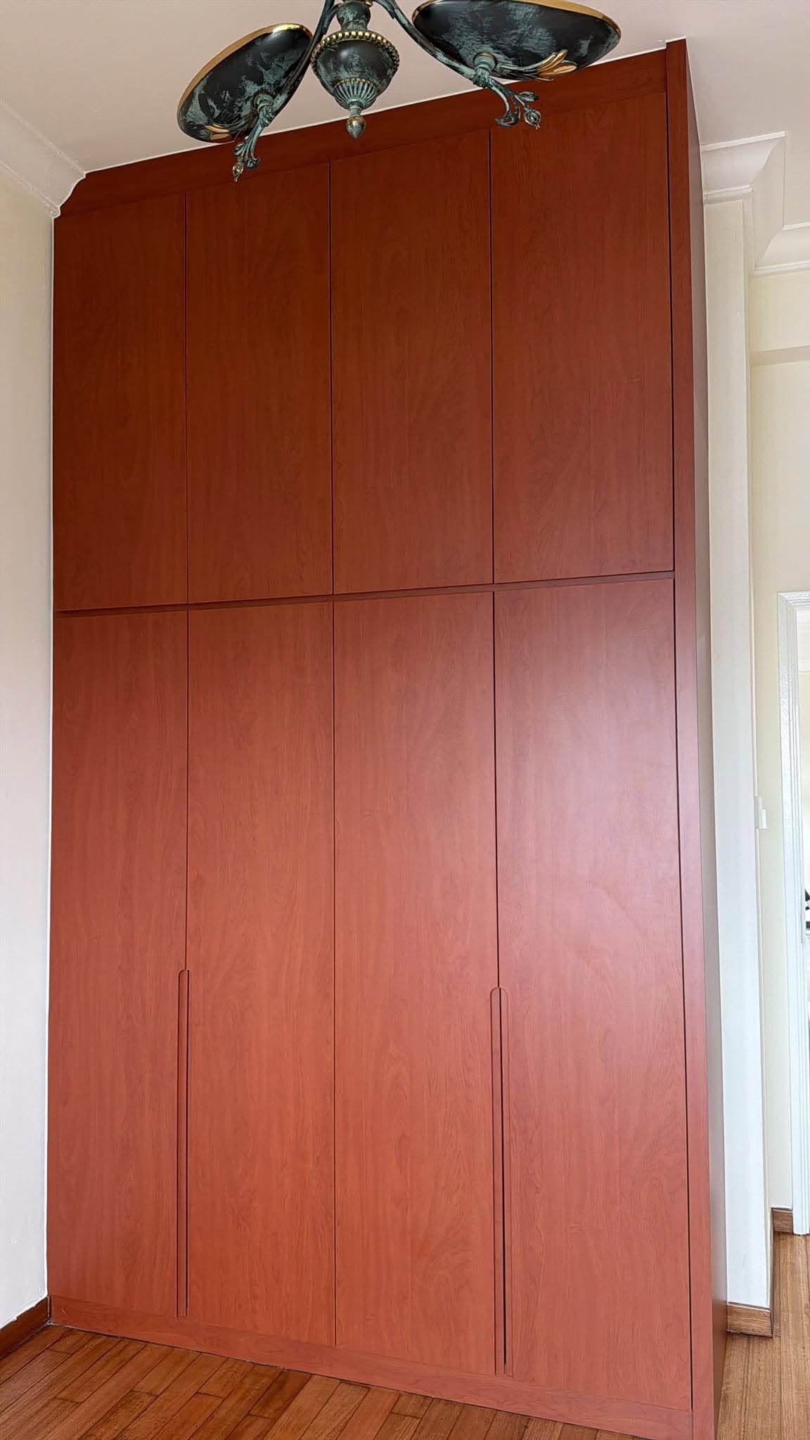 Handyman assembling furniture in a Singapore home