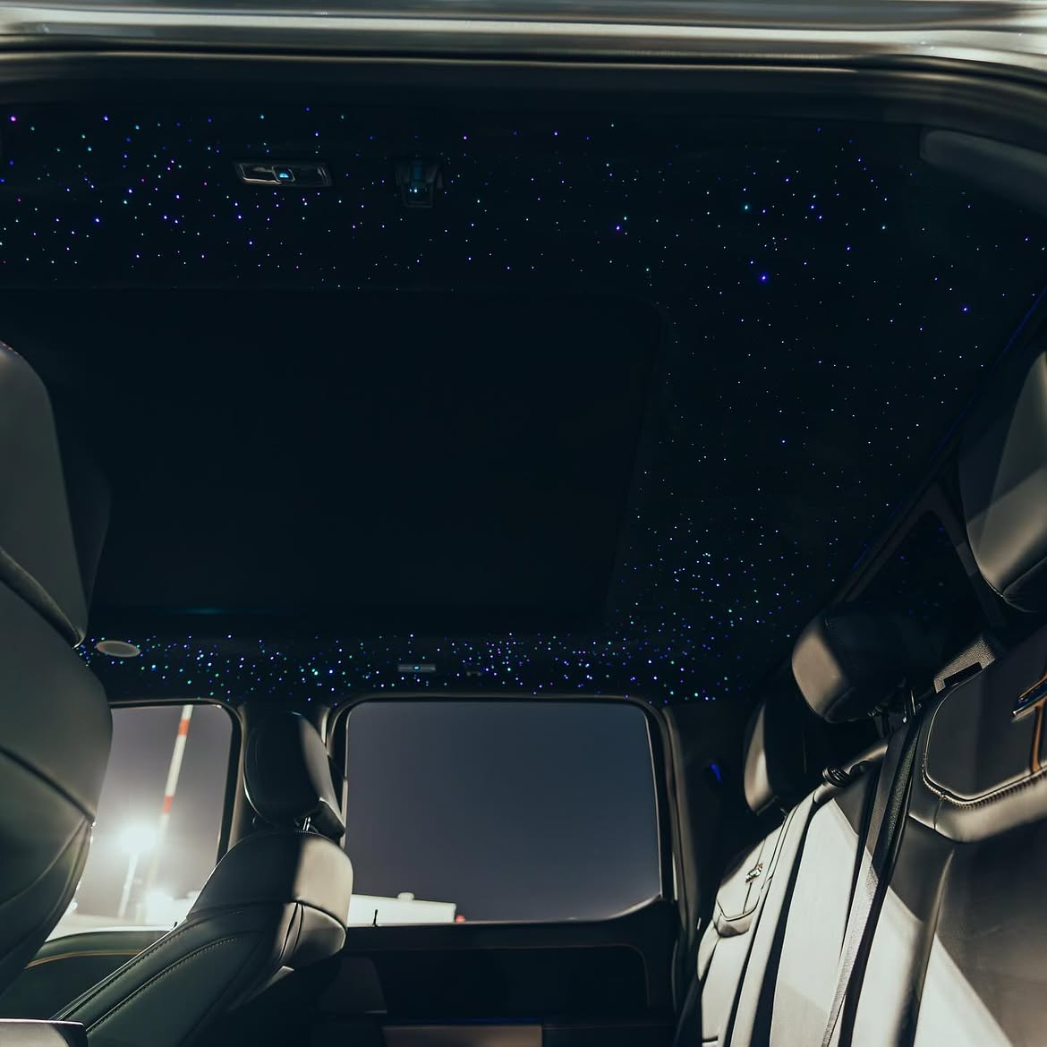 Custom fiber optic starlight headliner in a Ripon workshop install