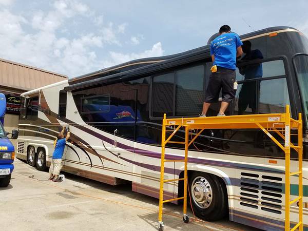 Professional technician detailing RV motorhome exterior — My Detail Guys Fort Worth