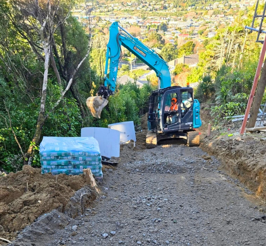Mini excavator digging residential site in Johnsonville