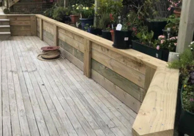 Timber retaining wall for sloped backyard in Wellington City