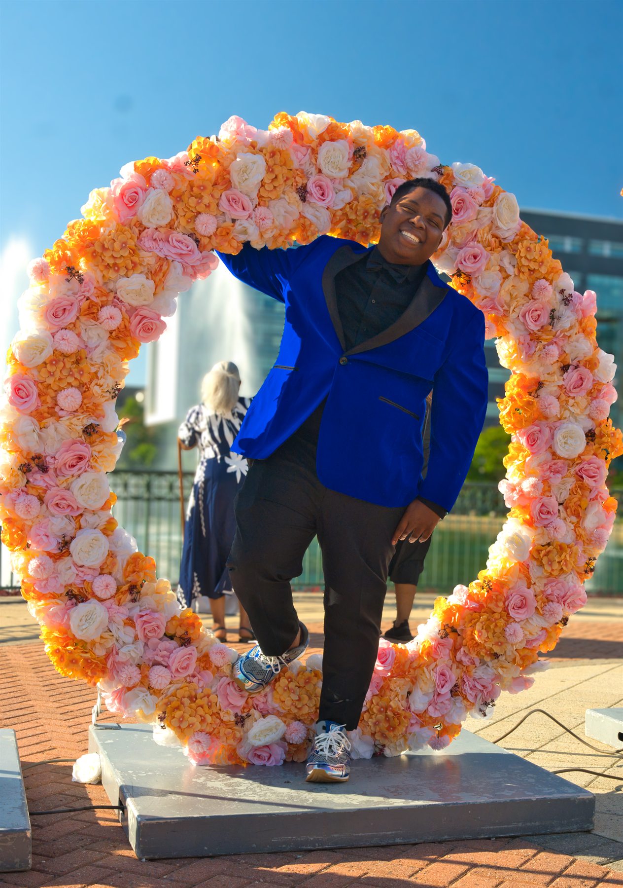Prom portrait in floral arch captured by Dreamin Innovations