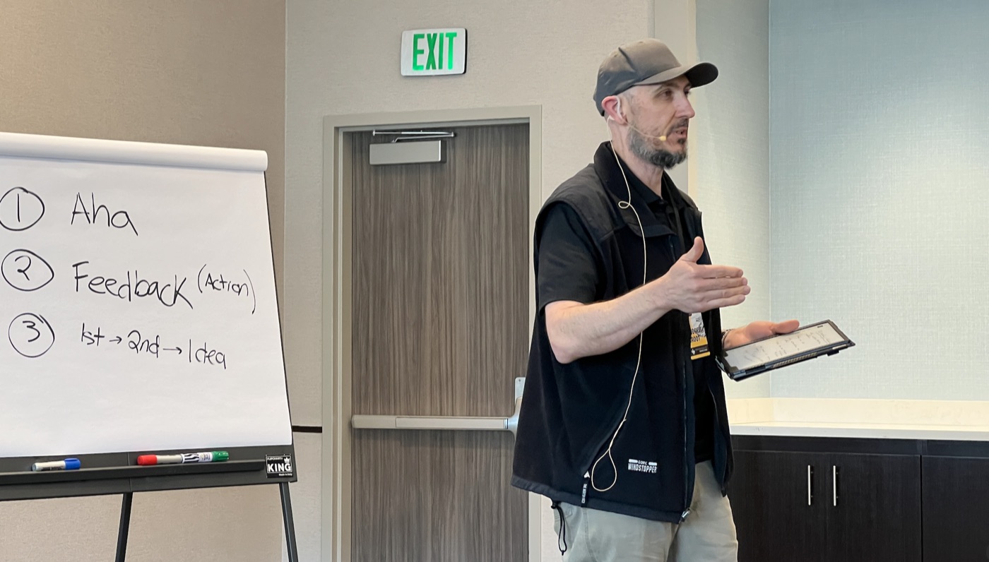 Andrew Croot, SERTBO founder, teaching at a business mastermind event