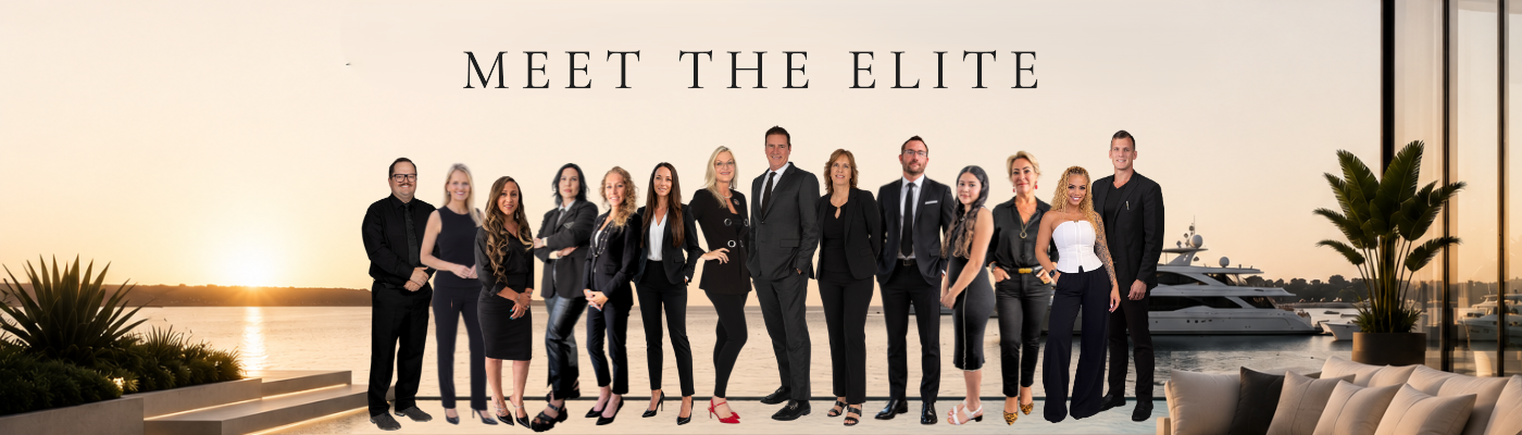 The Atlas Elite team with Compass, gathered on the waterfront terrace at sunset