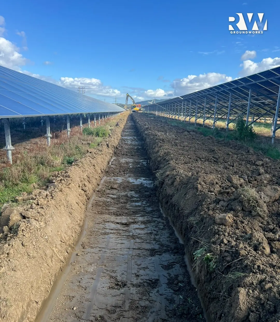 Drainage trench dug by RW Groundworks between two rows of solar panels on the X2 solar farm near Perth