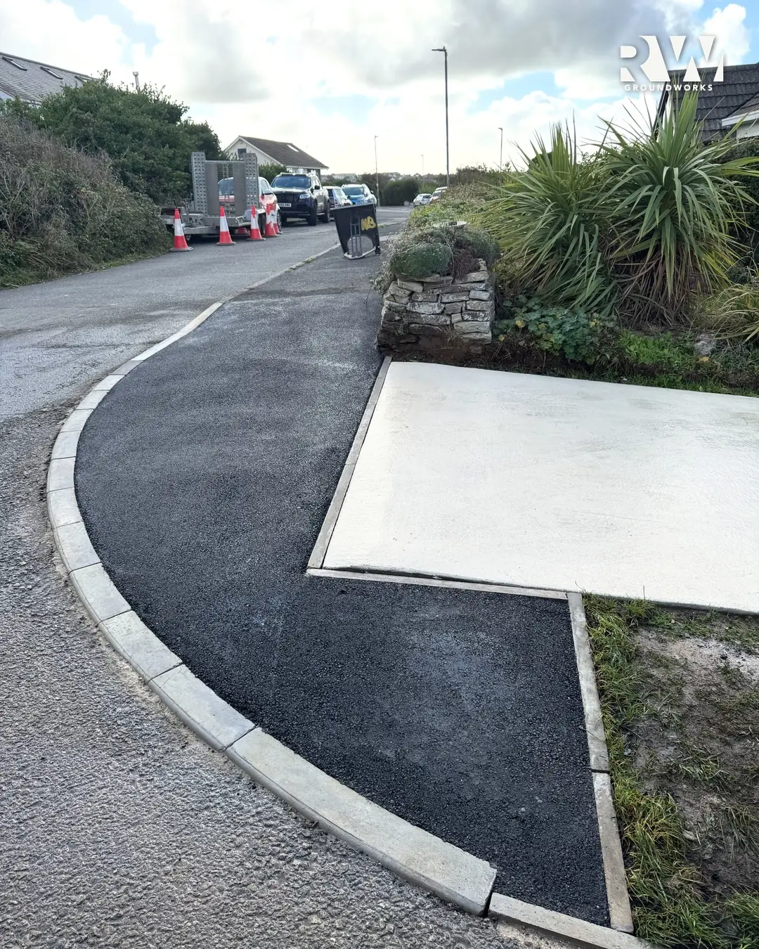 Finished dropped kerb in Newquay with new radius kerbs and a fresh tarmac apron