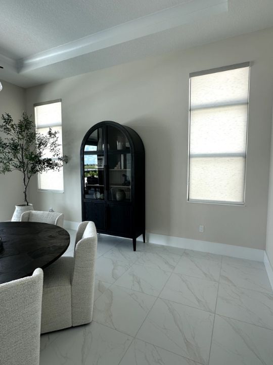 Dining room with Roller and Solar Shades