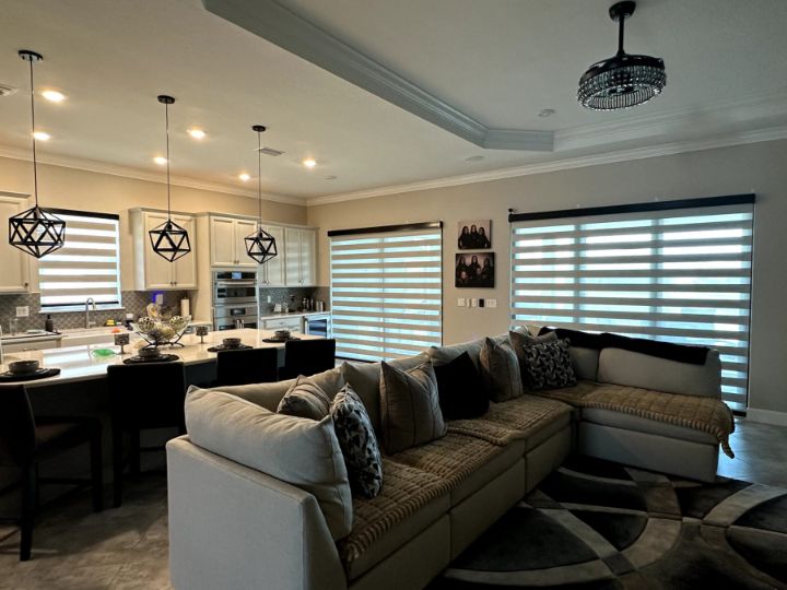 Kitchen and living with Zebra Roller Shades