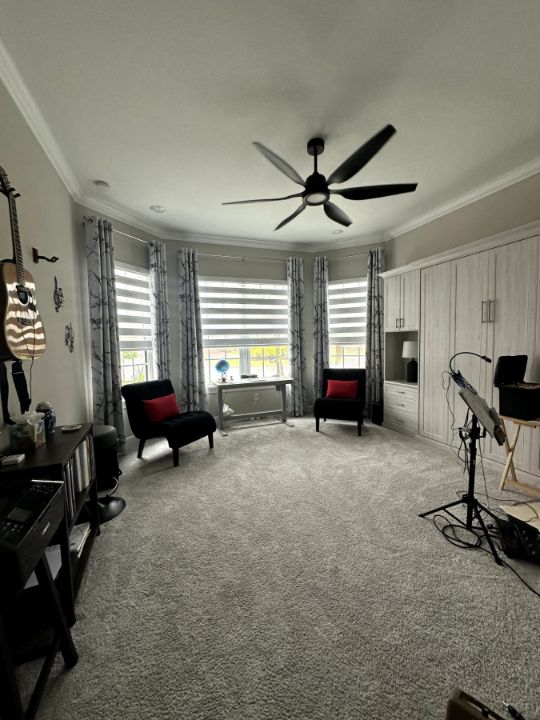 Bay window sitting room with Zebra Roller Shades