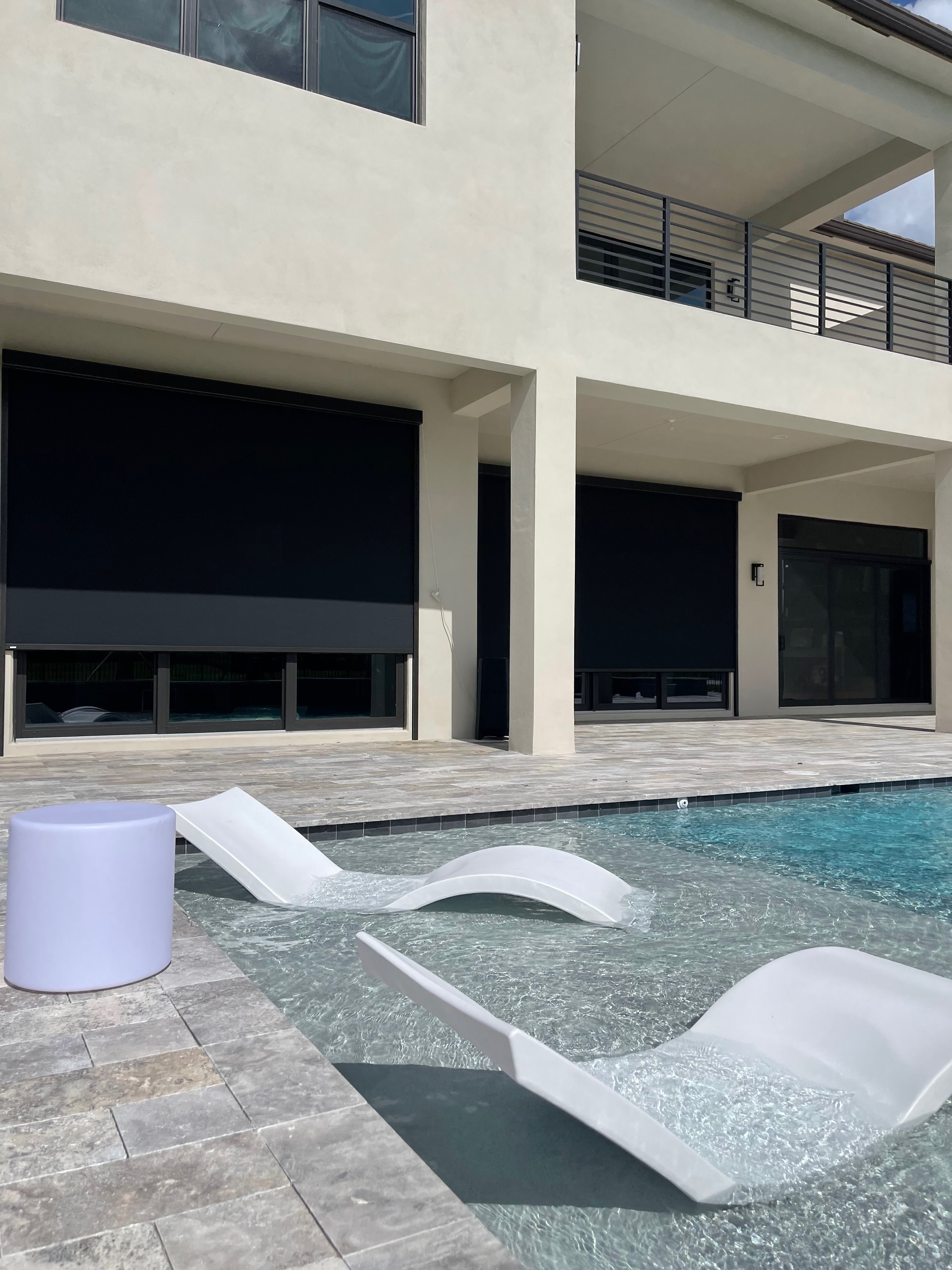 Exterior shades by Ambiance Shades & Blinds