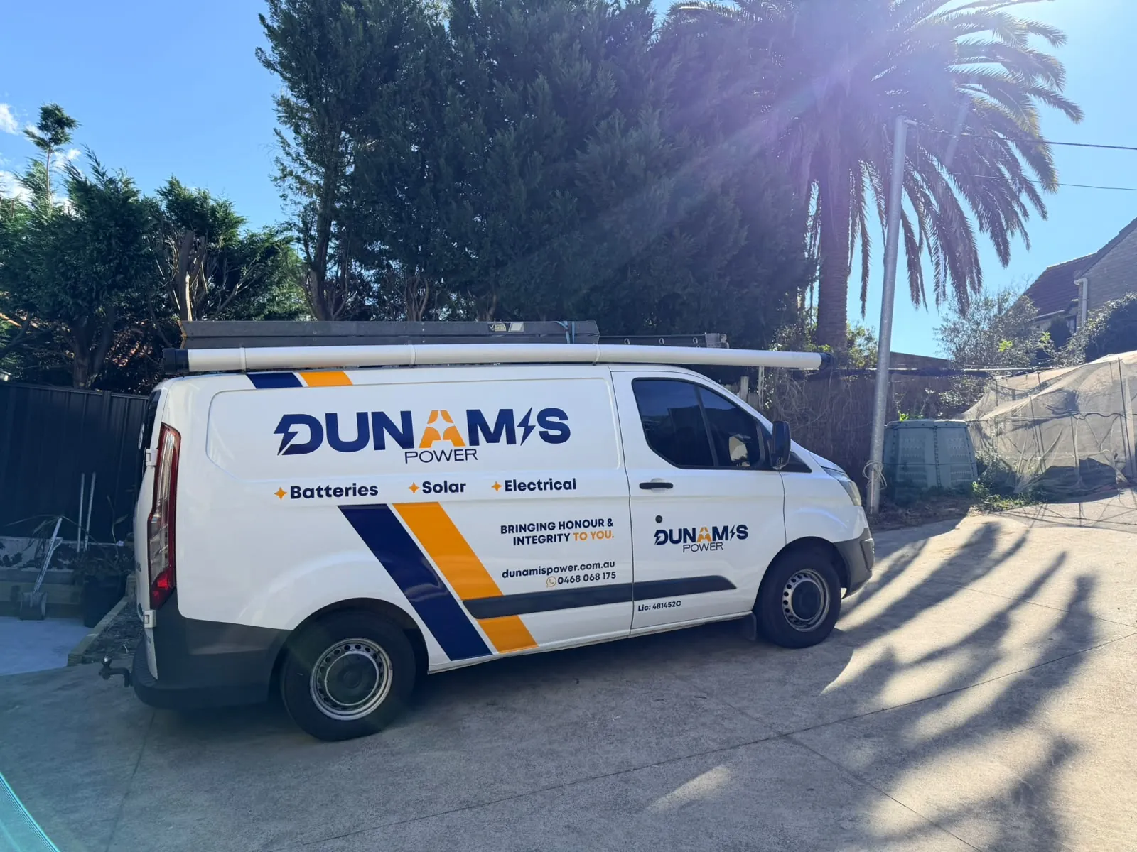Dunamis Power service van parked on a driveway